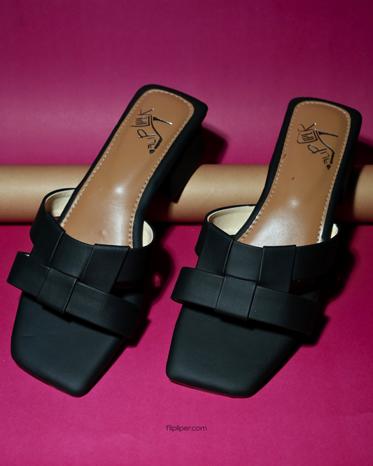 Flip Liper black bow-knot block heel sandals with tan insole displayed on a studio background