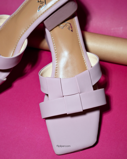 Flip Liper light pink bow-knot block heel sandals displayed on a soft pink studio background
