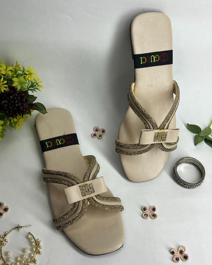 Beige women luxe flats with sparkling cross strap design