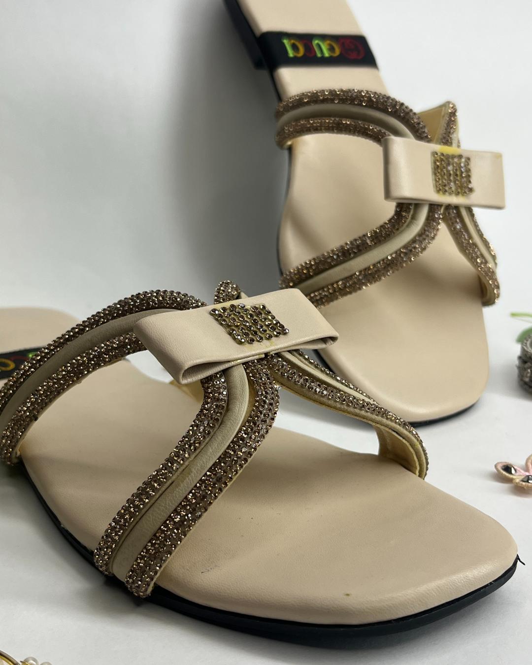 Beige women luxe flats with sparkling cross strap design